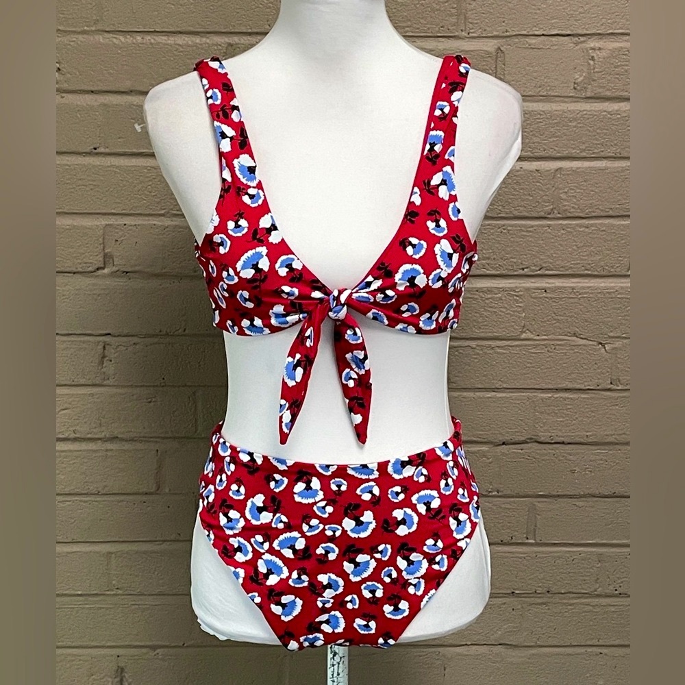 Dippin Daisy’s  NWOT. floral cutout swimsuit L